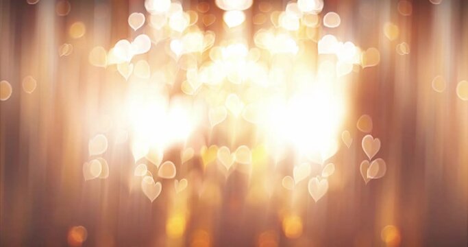 Glowing heart with bokeh effect on black background. Romantic Abstract Motion Background.