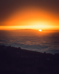 sunset over the sea of clouds