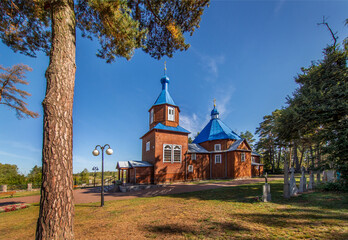 General view and close-up architectural details of the Orthodox church of St. Anthony Pechersky, built in 1868, in the town of Kuraszewo in Podlasie, Poland.