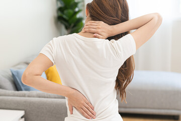Pain body muscles stiff problem, asian young woman painful back, neck ache from work hand holding...