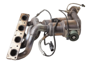 Automotive catalyst removed from a vehicle for repair with a ceramic coating inside as part of an exhaust system to remove harmful emissions in a car repair shop