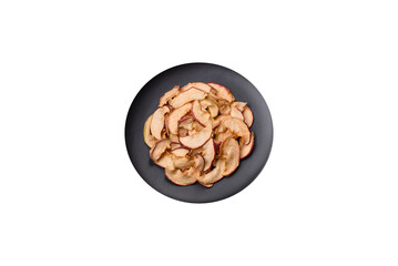 Delicious ripe red apple, sliced and dried in a special dryer
