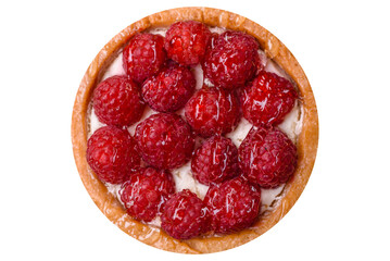 Delicious fresh sweet round tart with ripe raspberries and cream