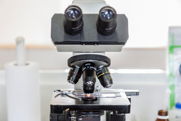 Fototapeta na wymiar Microscope with slide in a laboratory