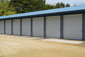 White and Blue storage units being used by the community - obrazy, fototapety, plakaty