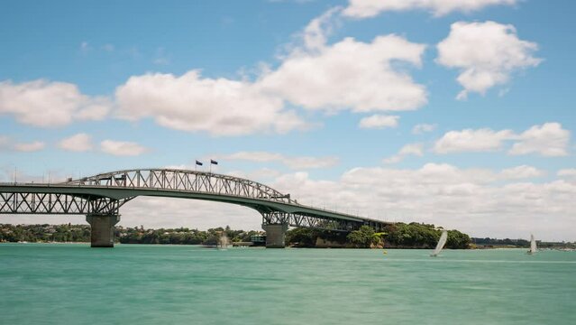 Time lapse of clouds moving above the Auckland Harbour Bridge, New Zealand.