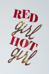 red girl hot girl ironical expression arranged on blank paper