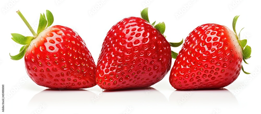 Poster single strawberries three one sliced in half on white backdrop with copyspace for text