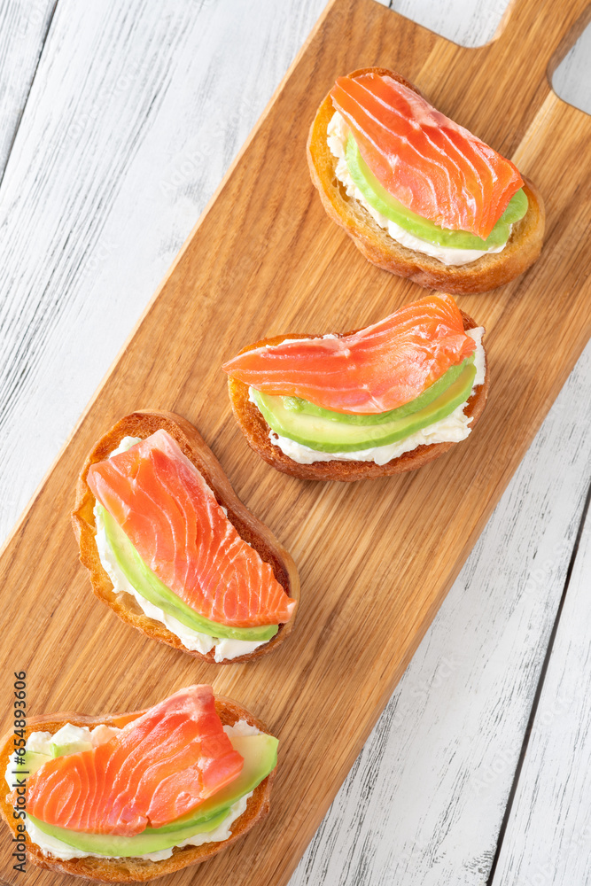 Poster sandwiches with avocado and salmon