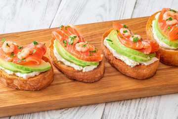 Sandwiches with avocado and salmon