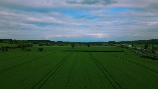 Unique aerial video above the green fields