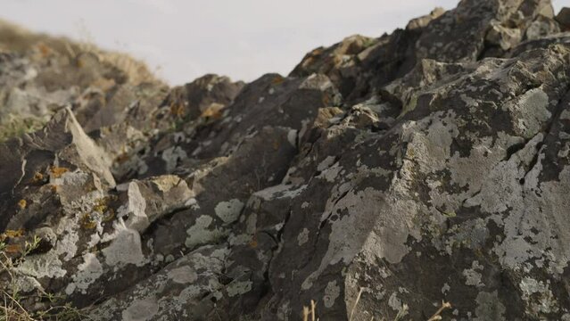 Slow motion of Sevan lake in October on a hazy day
