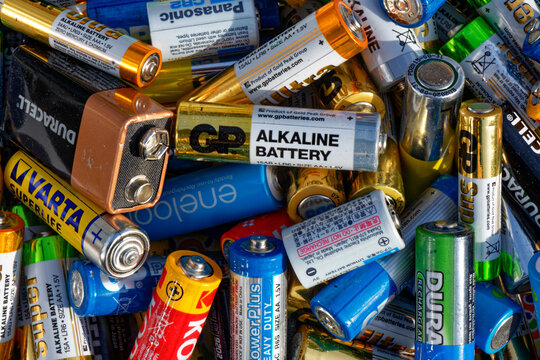Used alkaline batteries. Environmental pollution problem concept