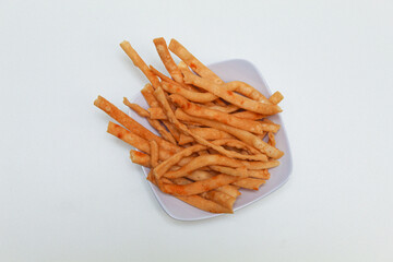 Cheese stick snacks, in a white bowl, isolated on white background