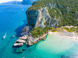 Drone view of the vibrant Cala Luna Beach on Sardinia island, Italy - 654937843