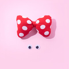 Minimal girl's face with with dotted bow on head. Creative aesthetic summer fashion trend layout. 
