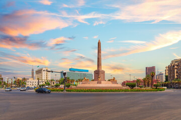 Ramses II Obelisk in the Tahrir Square, beautiful sunset view of Cairo, Egypt
