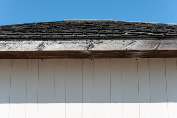 shed cedar wood roof, fascia, and metal siding