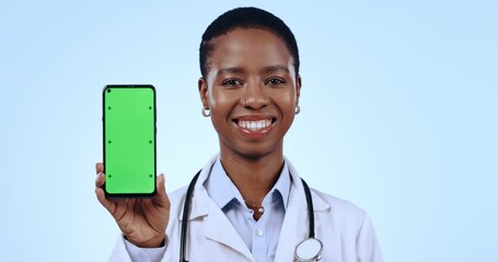 Phone, green screen and face of woman doctor in studio with mockup for advertising or marketing. Tracking markers, mock up and African healthcare worker with cellphone chroma key by blue background.