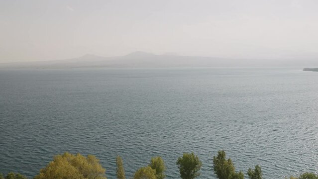 Sevan lake in October on a hazy day
