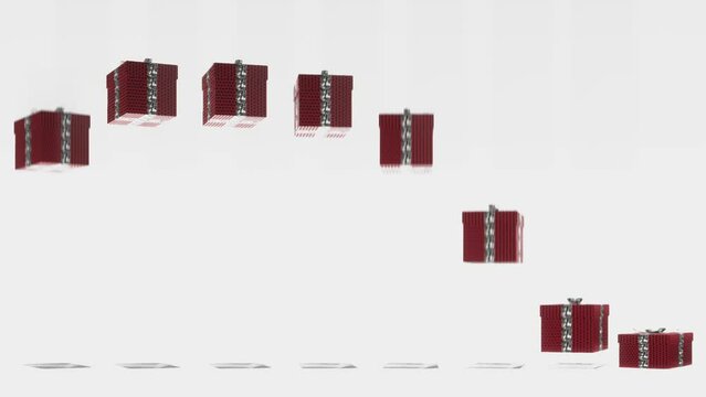 jumping christmas presents on white background with copy space video effect. Same possition but litle bit later delay wave pattern