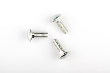 nuts and cogs isolated on white background. hex nut with slate close-up. screw with slate.