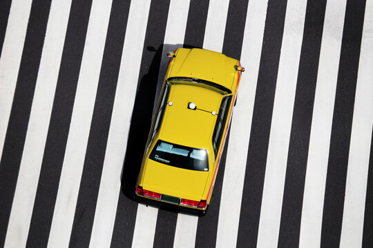Japanese taxi running over crosswalks