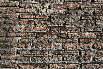 brick red wall. background of a old brick house. Seamless texture old brick wall. wall with red brick, red background.