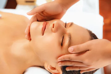 Poster Closeup woman enjoying relaxing anti-stress head massage and pampering facial beauty skin recreation leisure in dayspa modern light ambient at luxury resort or hotel spa salon. Quiescent © Summit Art Creations