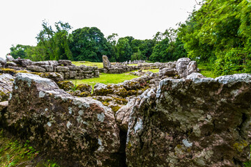 Stones at Din Lligwy ancient village in Anglesey. - 654997697