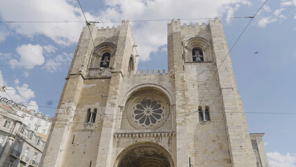 Fototapeta premium Low angle view of the cathedral walls. Action. Concept of ancient architecture and history.