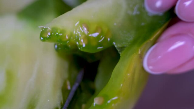 fresh green tomato Slicing red fresh tomatoes with knife, home kitchen. Fresh ripe organic vegetables, healthy eating concept. . High quality 4k footage