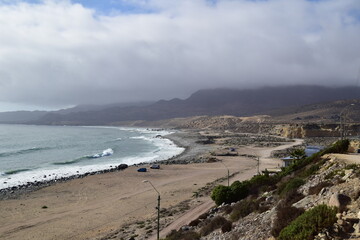 Pacific Ocean Coast in Chile: A stunning blend of rugged cliffs, pristine beaches, and marine life along Chile's picturesque Pacific shoreline.

