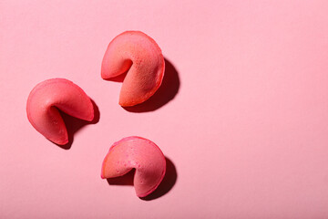 Fortune cookies on pink background