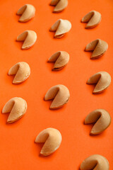 Fortune cookies on orange background