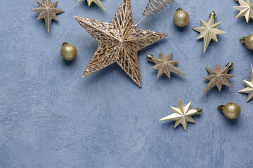 Christmas stars on grunge blue background