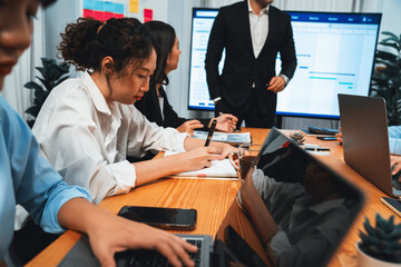 Project manager planning schedules for business task at meeting room, Gantt chart software show on...