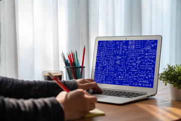 Mathematic equations and modish formula on computer screen showing concept of science and education
