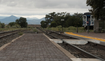 Empty platform and railroad tracks at Lamy depot - 1 © Dmitri Kotchetov