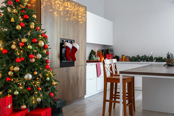 Interior of light kitchen with Christmas decor
