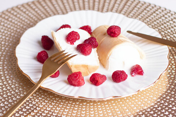 Sweet dessert, ice cream with raspberries on white plate
