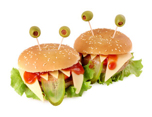 Cute monster burgers isolated on white. Halloween party food