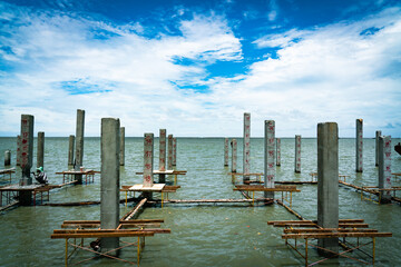 Piles run along the edge of the sea to create a viewpoint.
