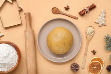 Composition with raw dough for tasty Christmas cookies and kitchen utensils on color background
