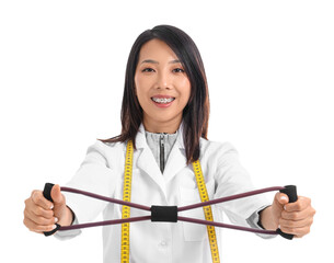 Female Asian nutritionist with fitness expander on white background