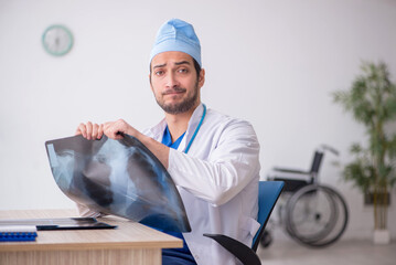 Young male doctor radiologist working in the clinic