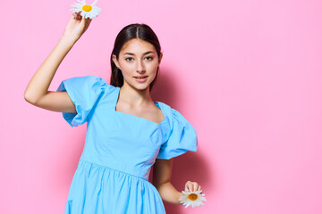 pink woman smile dress delicate fashion blue flower studio young camomile