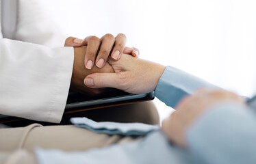 Fototapeta premium Hospital, holding hands and doctor with patient for care, comfort and empathy for diagnosis news. Healthcare consulting, clinic and health worker with person for support, wellness and medical results