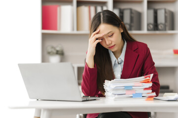 Asian people independent investment consultant captured in her element at office, donning vibrant...