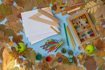 Old vintage concept of the teachers day. Back to school old vintage concept and space for text flat lay. School supplies with empty paper.